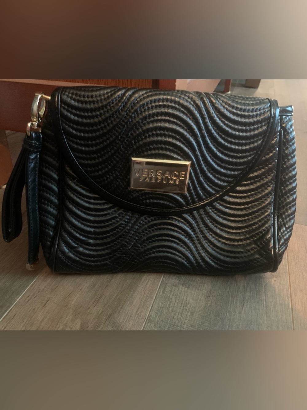 Versace Parfumes black clutch bag
